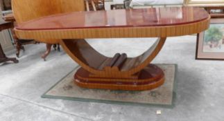A large oval modern dining table.