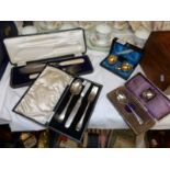 4 cased silver plate sets including salts, fish servers etc.
