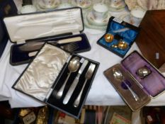 4 cased silver plate sets including salts, fish servers etc.