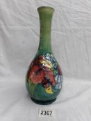 A Moorcroft vase, (27 cm).