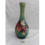 A Moorcroft vase, (27 cm).