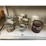 7 early mugs and loving mugs, early 20th century.