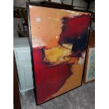 A large framed and glazed abstract painting.