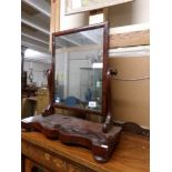 A Victorian mahogany toilet mirror.