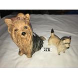 A Sylvac Yorkshire terrier and a Beswick dog.