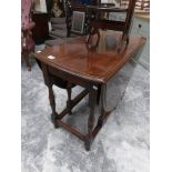 A good clean oak gate leg table.