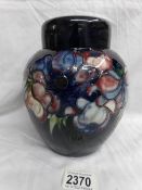 A Moorcroft ginger jar with cover (21 cm).