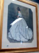 A framed and glazed print depicting a lady wearing a ball gown.
