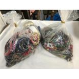 2 bags of costume jewellery.