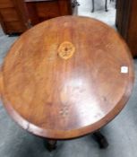 A Victorian oval mahogany inlaid loo table.