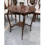 A mahogany occasional table.