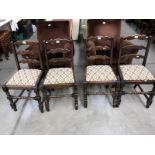 A set of 4 dining chairs,