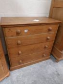 A pine 4 drawer chest.