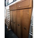 Two 3 door wardrobes with top boxes.