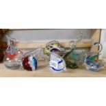 A mixed lot of coloured glass including swan dishes, fish paperweights etc.