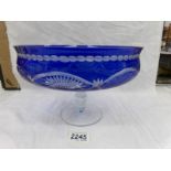 A blue cut glass footed bowl.