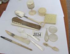A mixed lot of Victorian mother of pearl and ivory items.