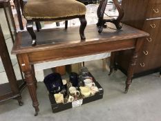 A Victorian mahogany desk with leather inset