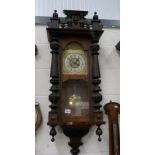 A Victorian mahogany 8 day wall clock, in working order.
