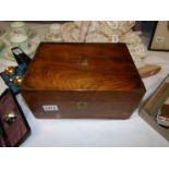 A Victorian figured mahogany writing box.
