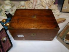 A Victorian figured mahogany writing box.