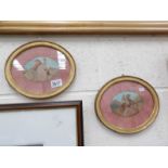 A pair of oval framed and glazed watercolour studies of horses.