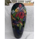 A tall Moorcroft vase, (38 cm).