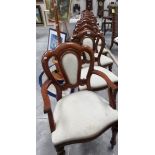 A set of 10 mahogany chairs comprising 2 carvers and 8 diners.