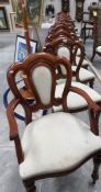 A set of 10 mahogany chairs comprising 2 carvers and 8 diners.
