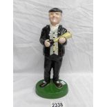 A Lorna Bailey figure of Fred Dibnah with horn.