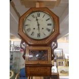 A Victorian mahogany inlaid drop dial wall clock.