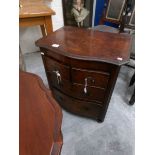 A small 2 over 2 mahogany chest of drawers.