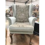 A wingback armchair