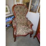 A mahogany framed gentleman's chair.
