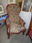 A mahogany framed gentleman's chair.