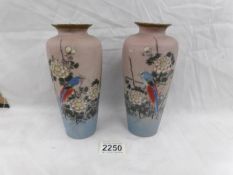 A pair of ceramic vases hand painted with flowers and birds, 1 a/f.