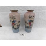 A pair of ceramic vases hand painted with flowers and birds, 1 a/f.