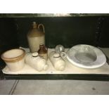 An original Perfection bed, Douche pan (Grimwades) and a quantity of stoneware bottles etc.