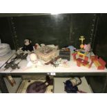 A miscellaneous lot including dolls houses, ice skating blades, PG monkey etc.