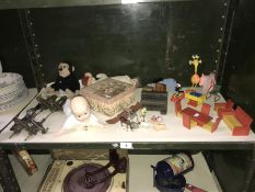 A miscellaneous lot including dolls houses, ice skating blades, PG monkey etc.