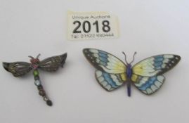 A dragonfly brooch marked 925 and a butterfly brooch.