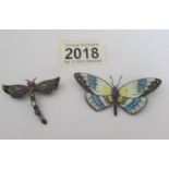 A dragonfly brooch marked 925 and a butterfly brooch.