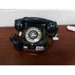 A vintage dial telephone.