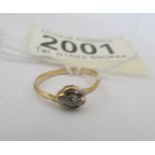 A 9ct gold ring set diamonds.