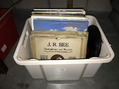 A box of assorted LPs and 78 records.