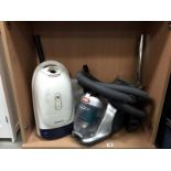 A Vax power 5 vacuum and Panasonic vacuum cleaner etc