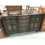 A dark wood sideboard