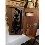 A cased microscope by Beck's of London, case marked 1945.