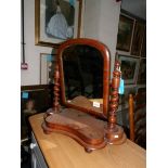 A Victorian mahogany toilet mirror.