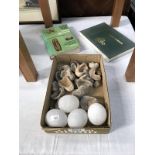 A mixed lot of shells, eggs and 2 books.